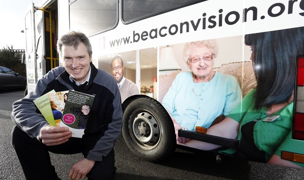 Pete Moodie infront of the Beacon Bus
