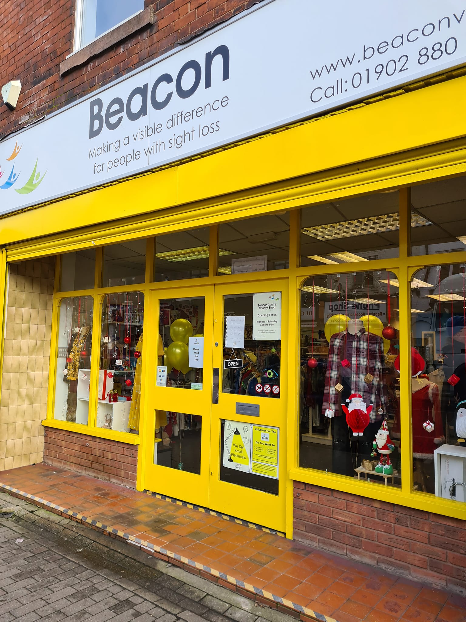 This shows the front of our Bloxwich shop which is painted yellow.