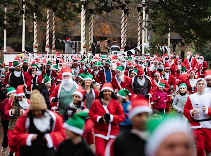This shows participants in our 2022 Santa Run setting off. 