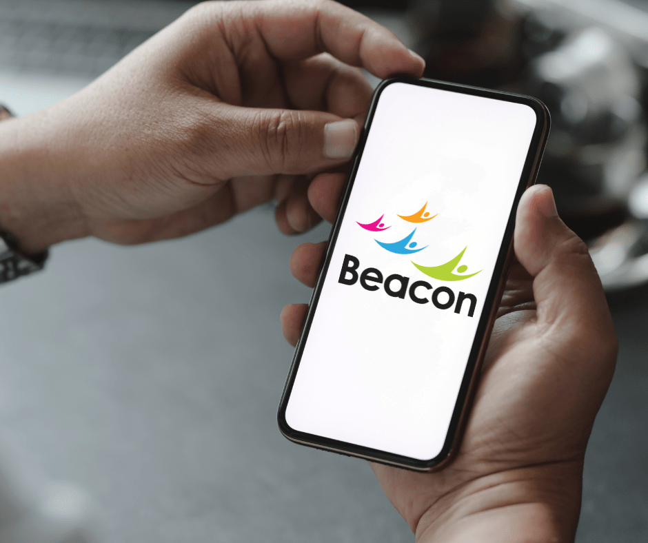 This shows a phone with the Beacon logo inside someone's hands.