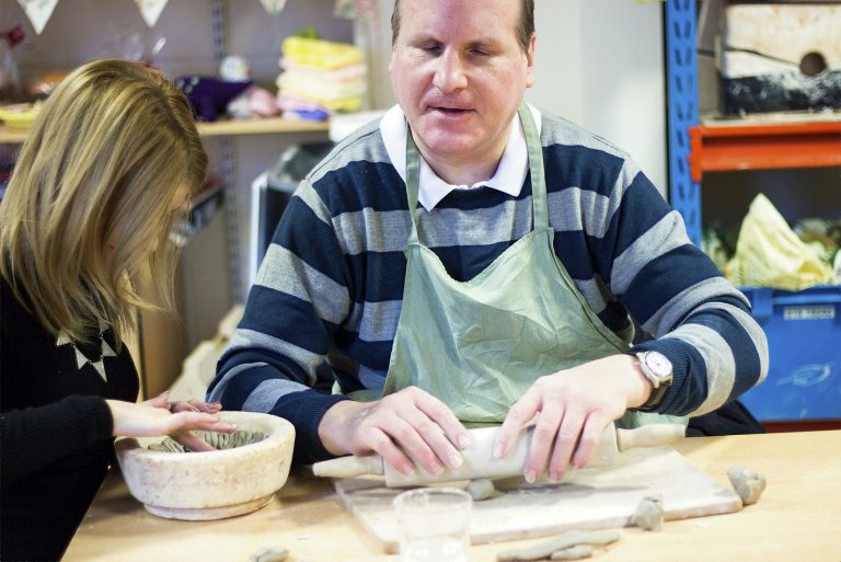 One of our members enjoying pottery.